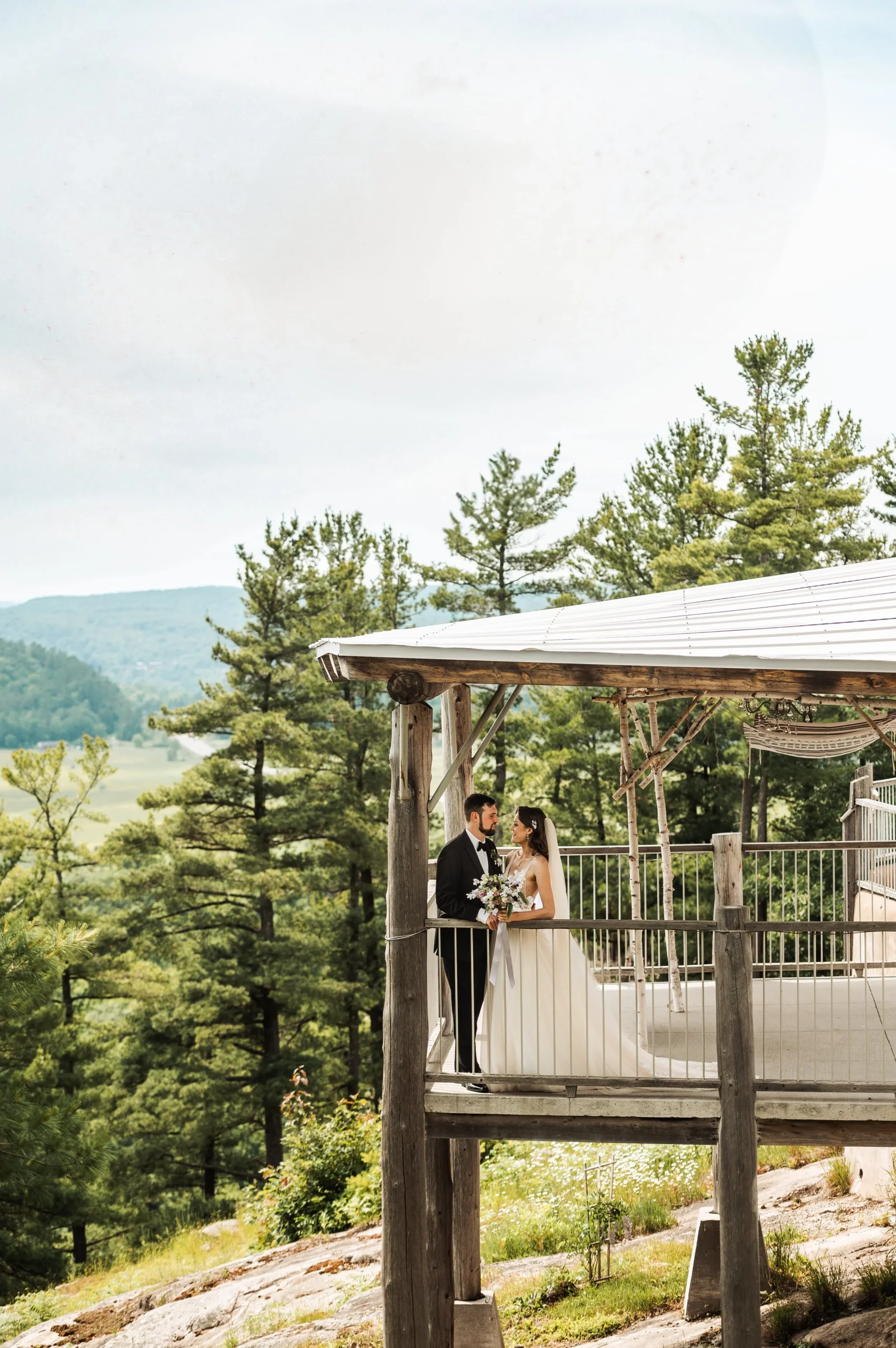 Bride and groom on Le Belvedere's terrace exchnaging private vows