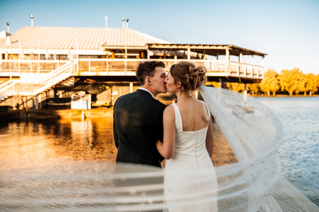 Couple sharing golden hour wedding portraits beside Lago wedding venue at Dow’s Lake in Ottawa
