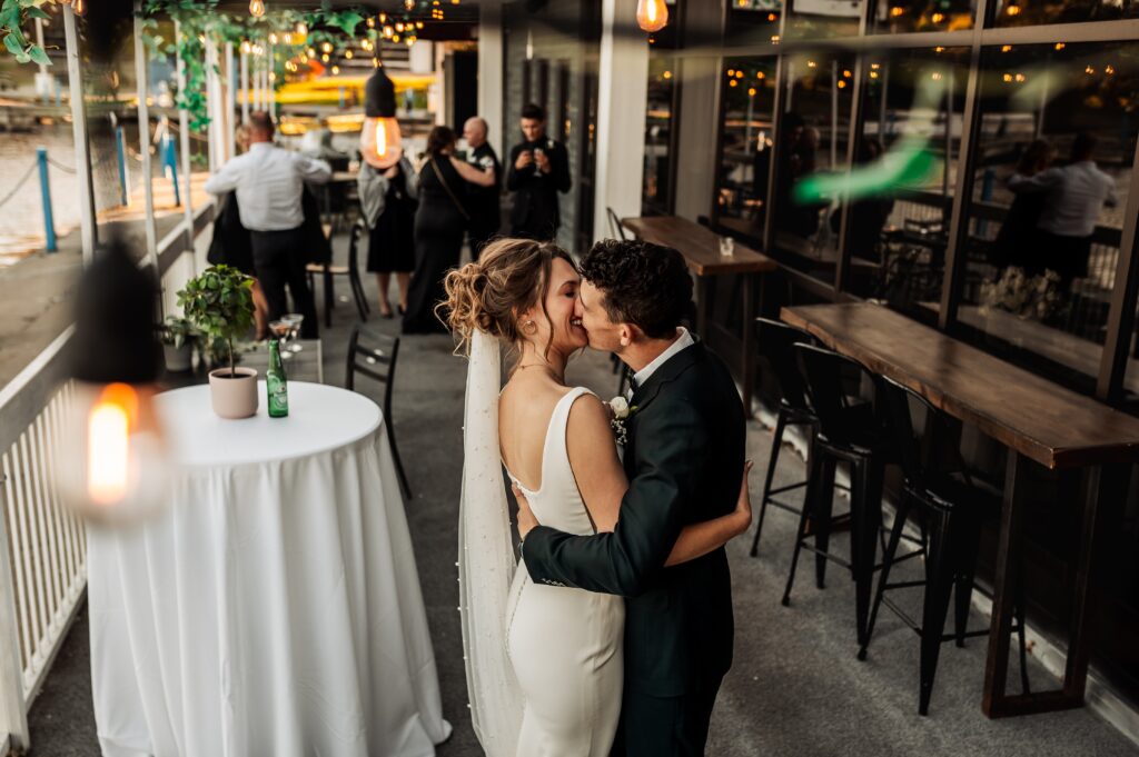 Bride and groom portraits on the patio at Lago wedding venue near Dow’s Lake in Ottawa