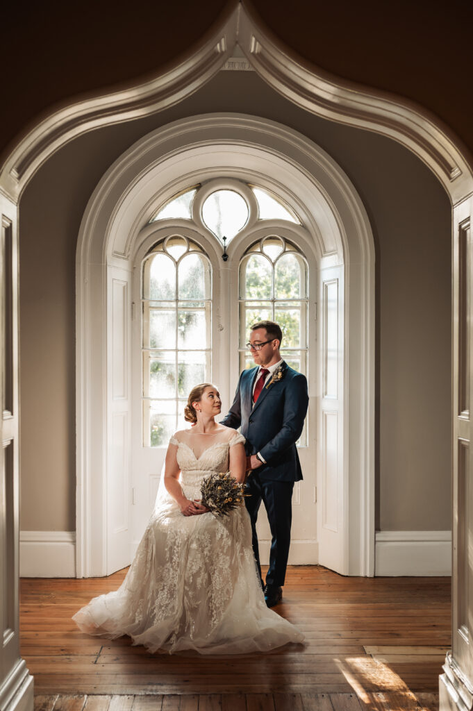 Bride and groom posing indoor at strathmere farmhouse