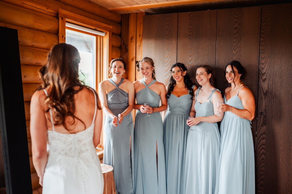 Bride getting ready at log home in Jabulani Wineyard