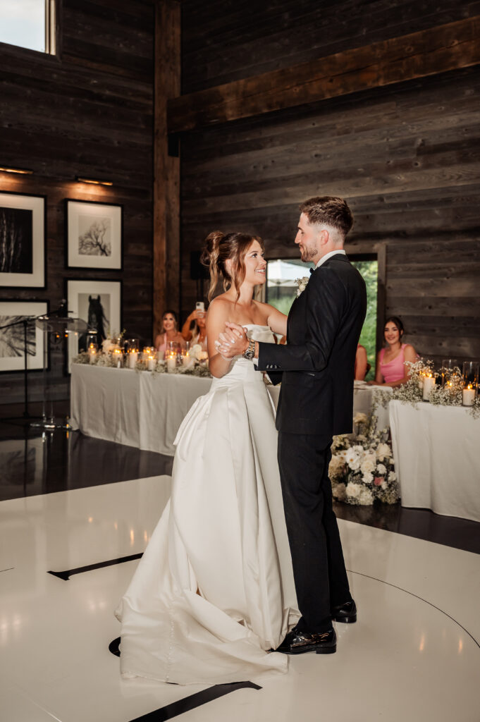 Bride and Groom dancing in the reception barn